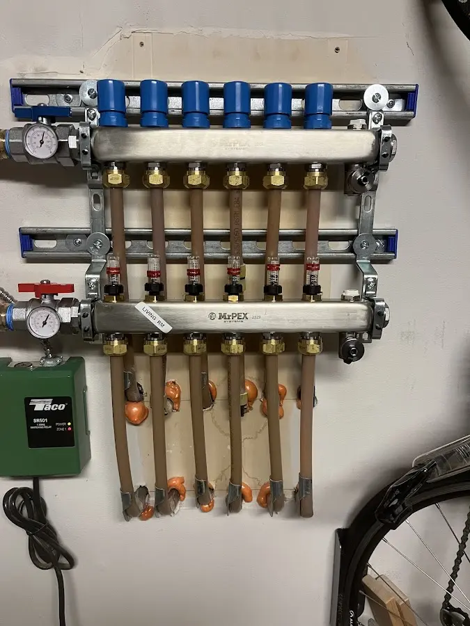 Plumber performing Gas Line Installation at a residential property in Gardner